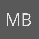 Madeline Brozen avatar consisting of their initials in a circle with a dark grey background and light grey text.