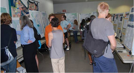 A small corridor made the meeting look more crowded.