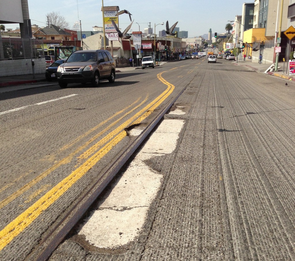 Eyes on the street: resurfacing scrape reveals old streetcar railroad track under 7th Street at Burlington  Avenue, just east of MacArthur Park