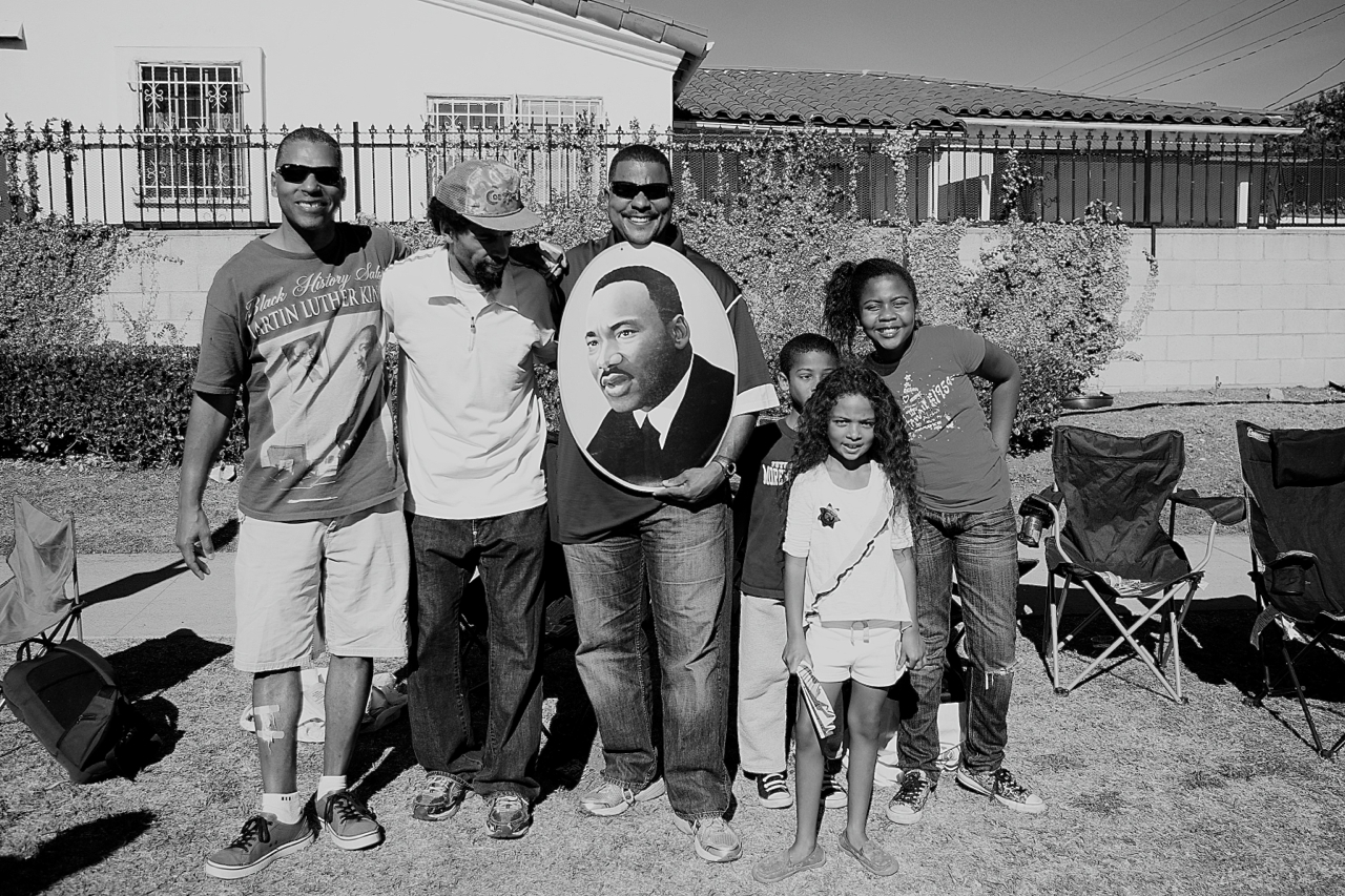 Families along Martin Luther King Blvd. celebrate at the King Day parade last year. Sahra Sulaiman/Streetsblog L.A.