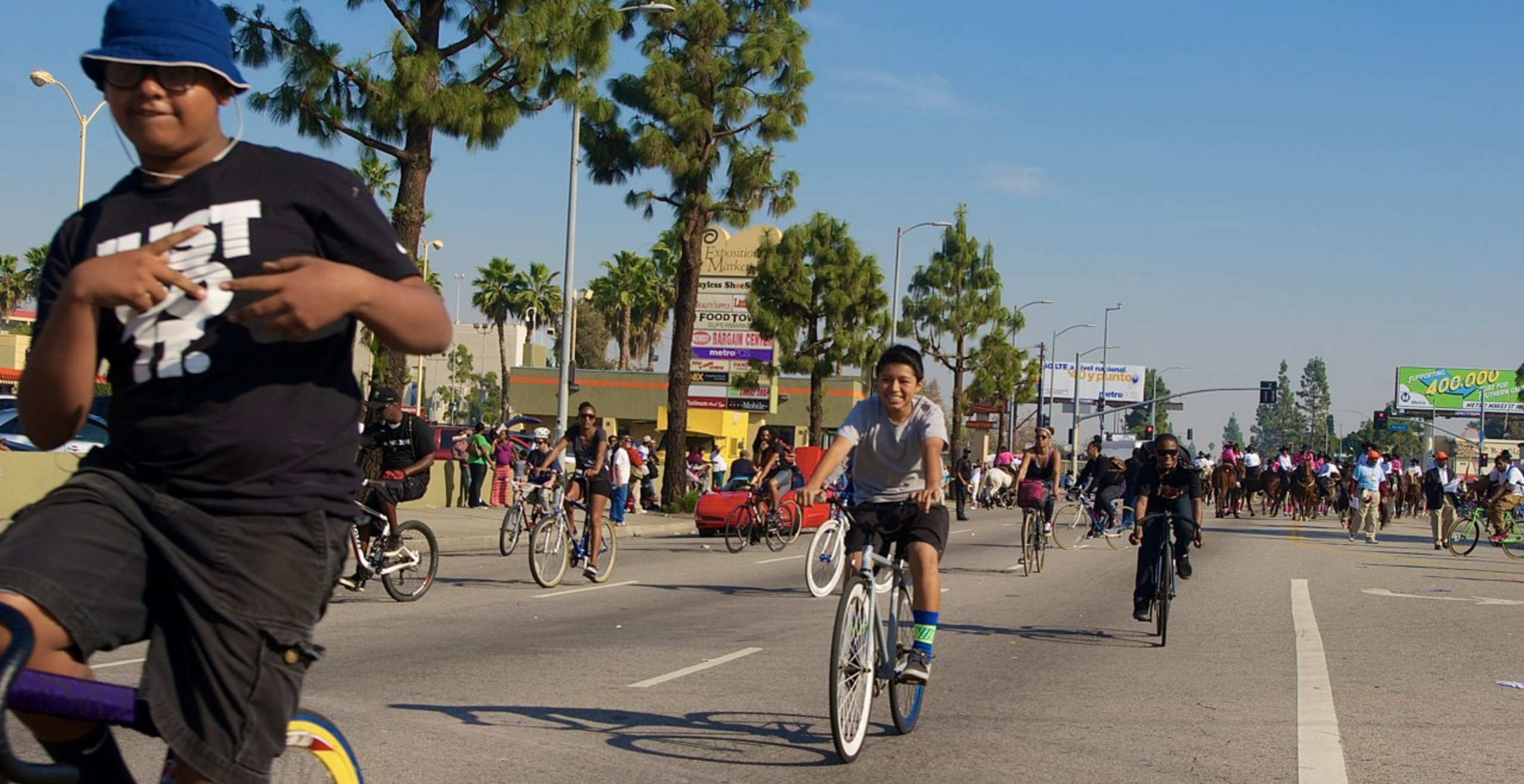 Three of the four kids that an LAPD officer claimed were supposedly causing problems during the parade and making everything a mess. In contrast, I found these kids to be incredibly sweet, experienced and knowledgeable about cycling and bike maintenance for their age, and super-excited to be able to be in the street with older riders they admired. Sahra Sulaiman/Streetsblog L.A.