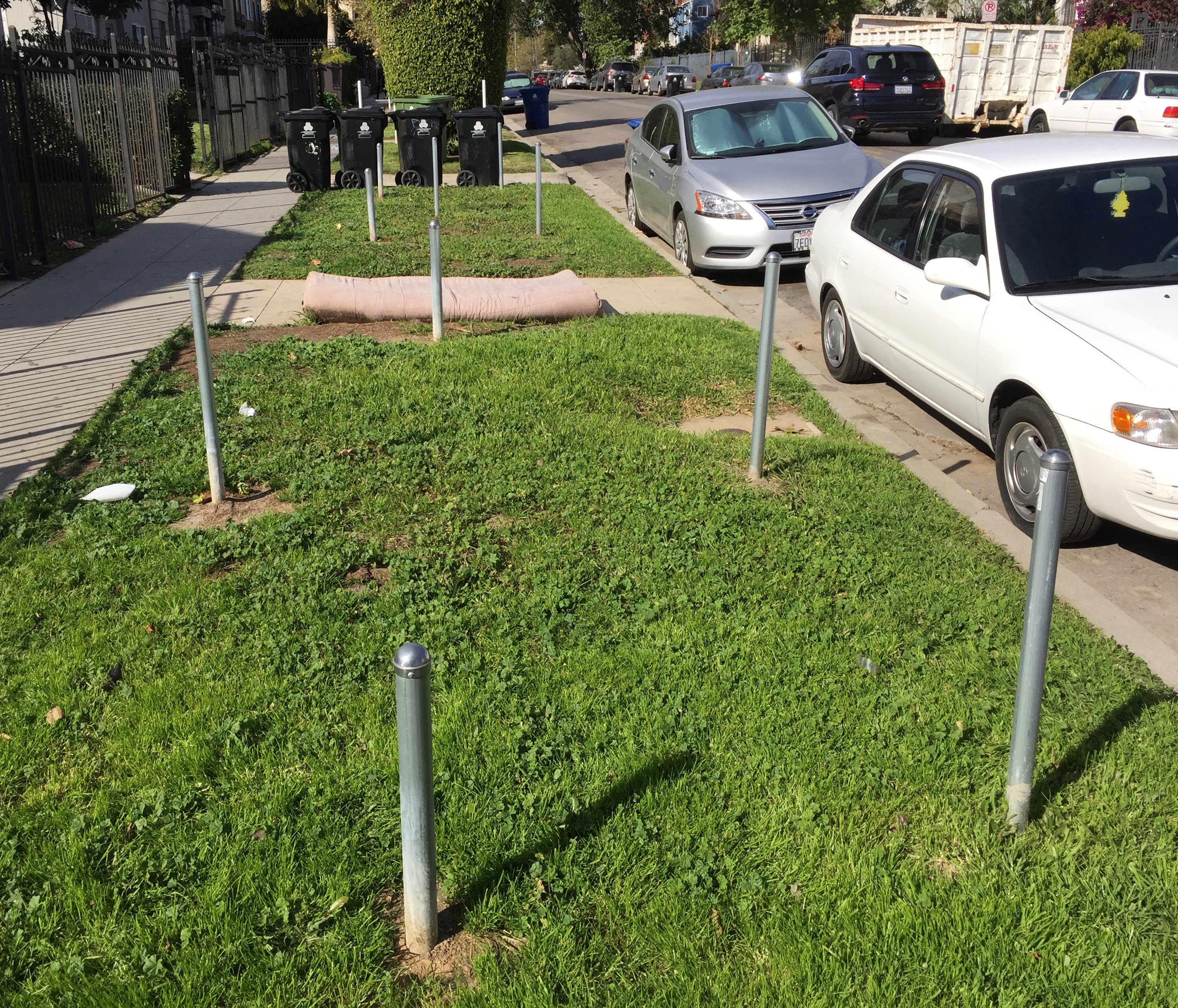 Most are painted yellow, but these Koreatown anti-parking posts are stainless steel
