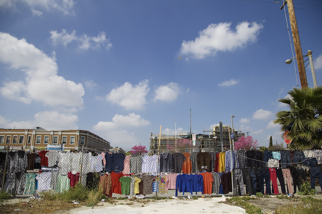 The lots at Manchester and Vermont have held the community hostage to blight for 25 years. Vendors have helped give the property some life. Sahra Sulaiman/Streetsblog L.A.