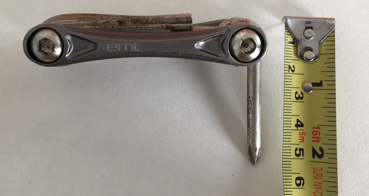 The Phillips-head screwdriver is 2-inches long as part of a 3-inch long multi-tool
