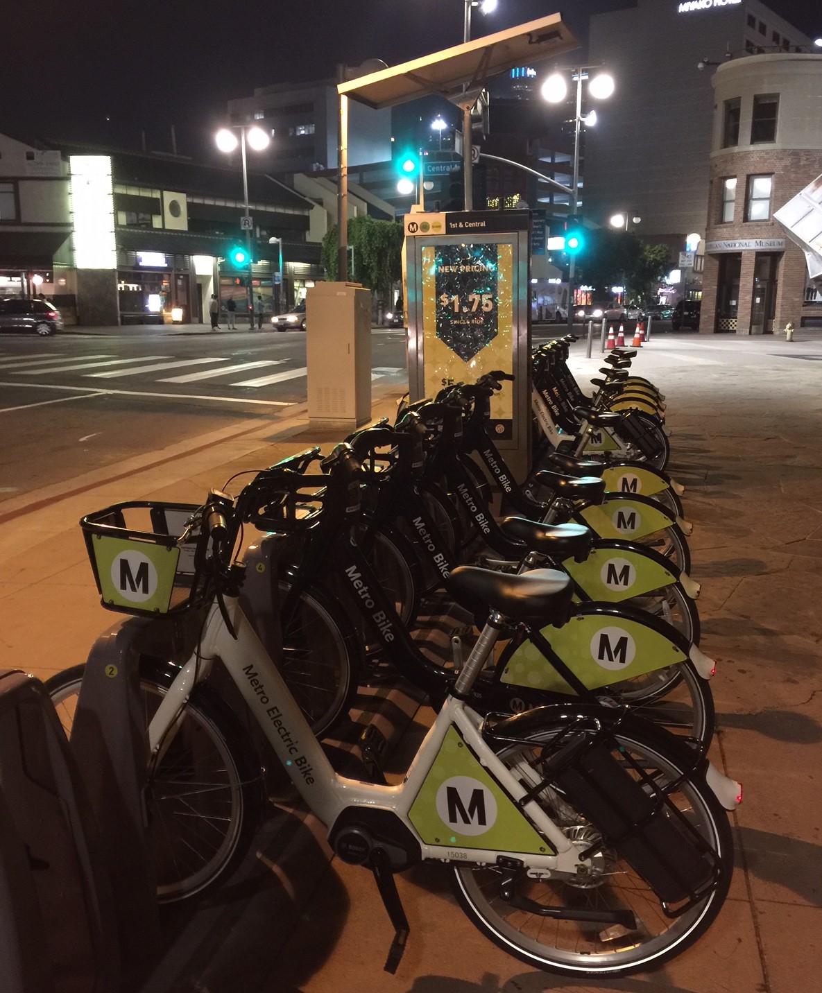 White Metro e-bike docked in Little Tokyo