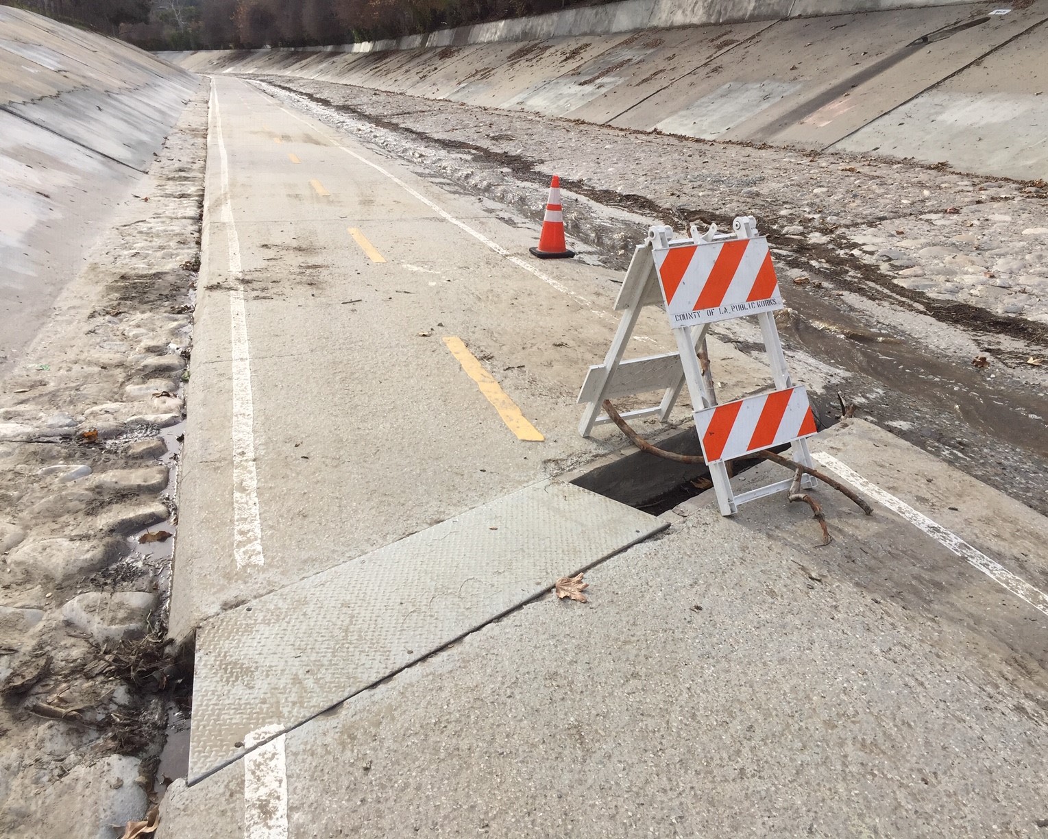 Metal panel detached on Arroyo Seco bike path