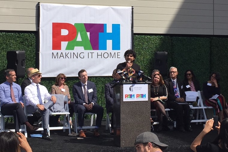 PATH Metro Villas tenant Blake Castro speaking at today's opening ceremonies