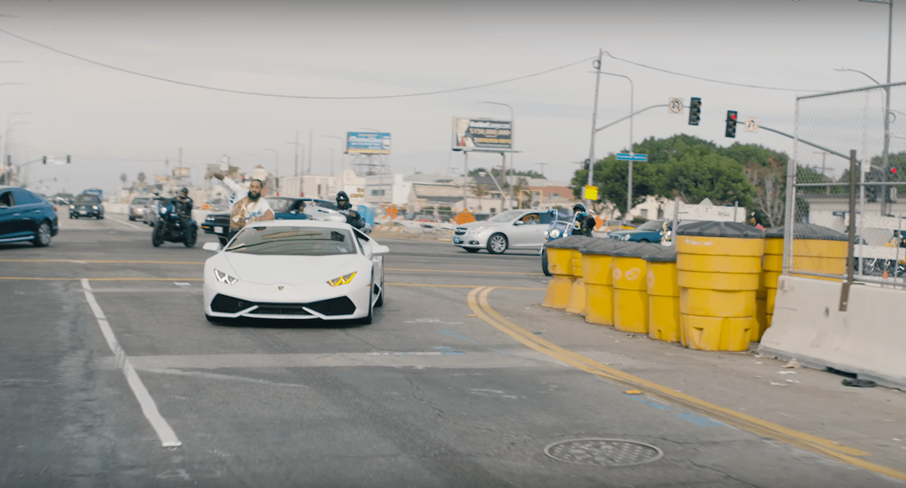 Crenshaw Line construction materials make a cameo as Hussle rounds the corner at Crenshaw and Slauson in the video for "Last Time that I Checc'd." Torn up sidewalks and streets, fencing in front of businesses, street closures, and more have vexed residents for years.