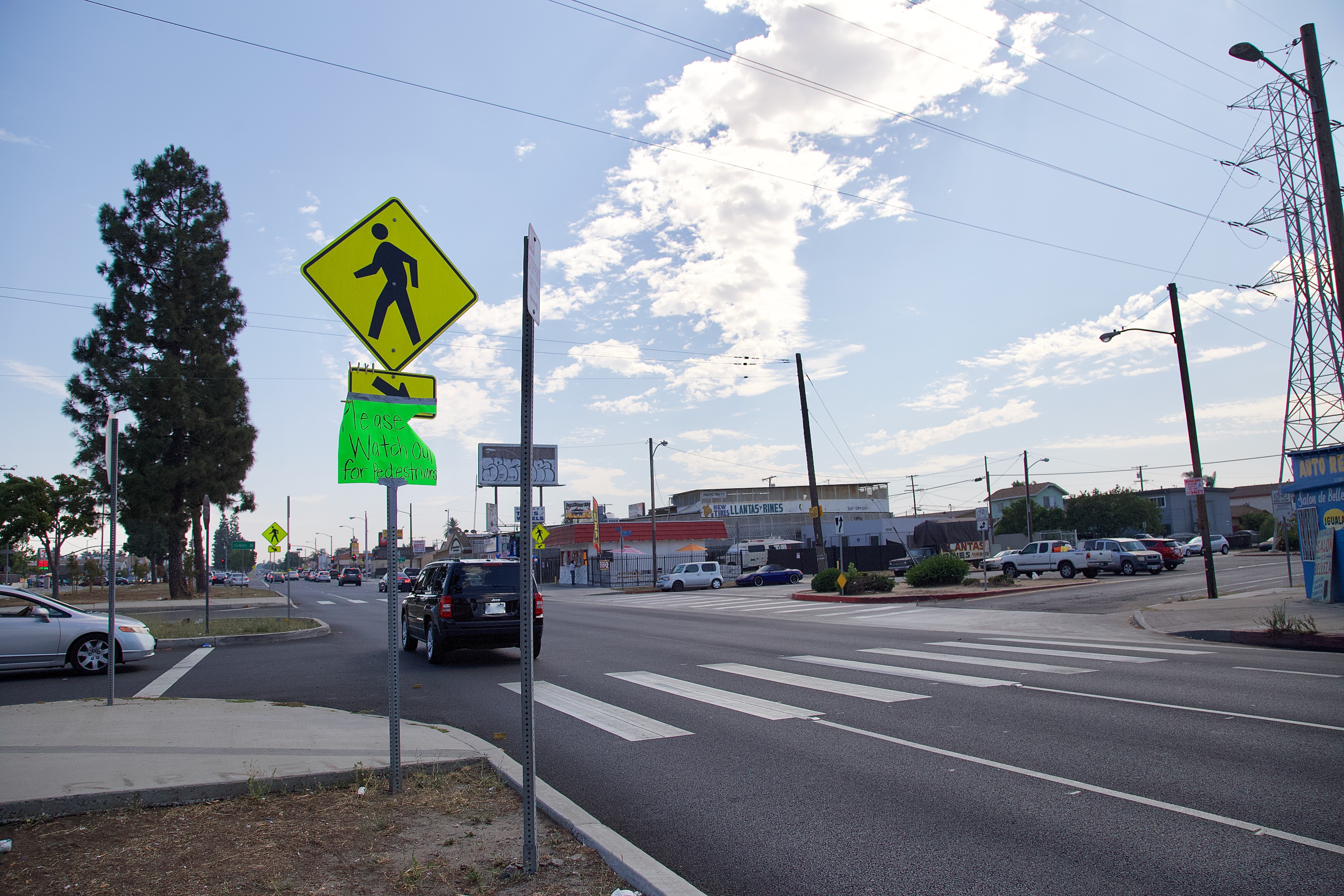 Family and friends posted home made signs hoping to pique drivers' consciousness. Sahra Sulaiman/Streetsblog L.A.