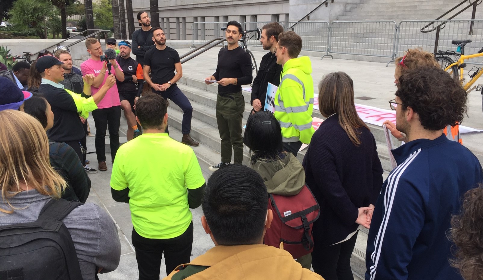 Speakers at this morning's Vision Zero die-in