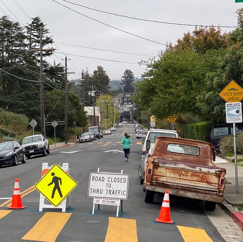 Oakland Slow Streets put signs in the traffic lane. Photo by city of Oakland.