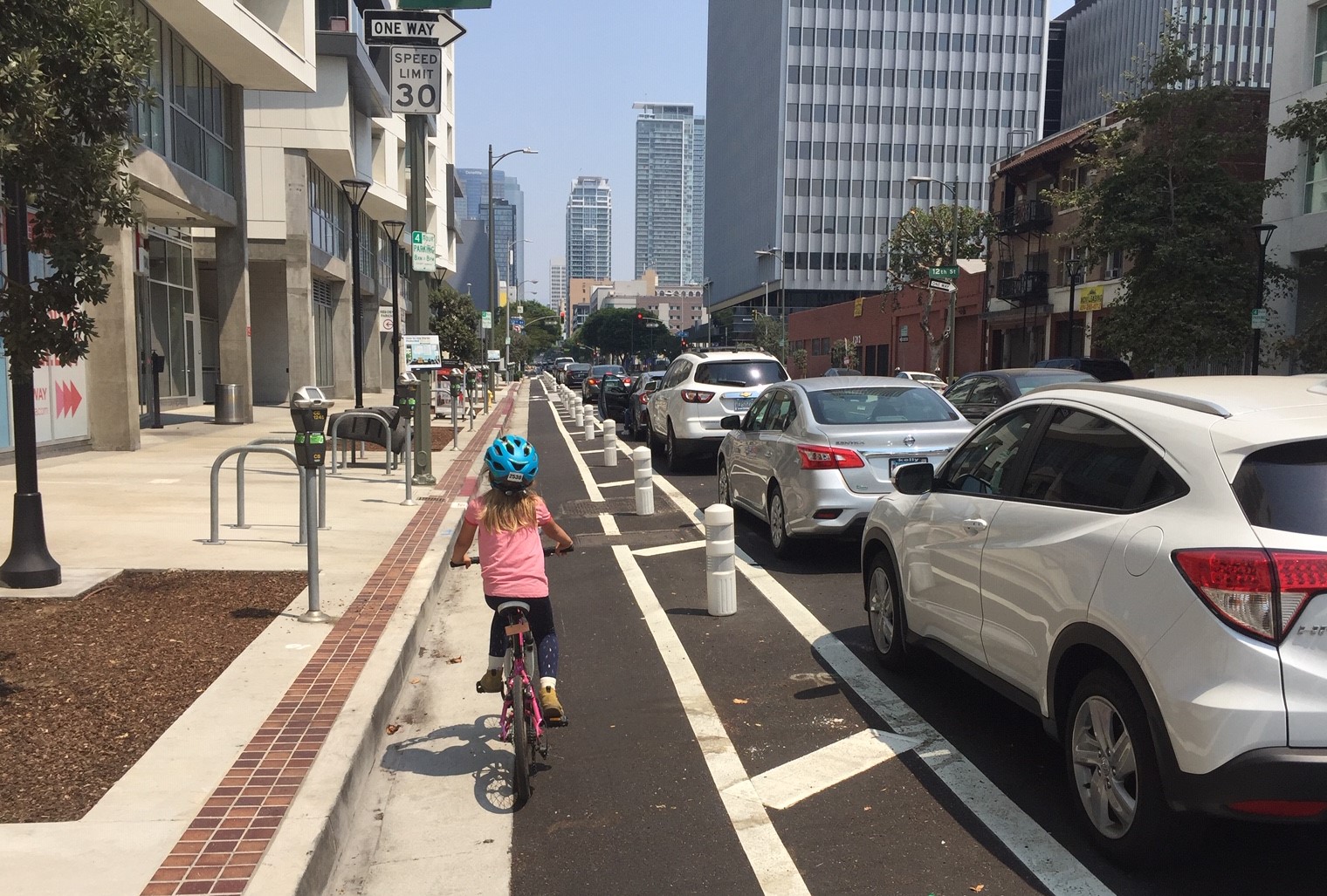 Newly upgraded northbound parking-protected bike lane on Olive Street.