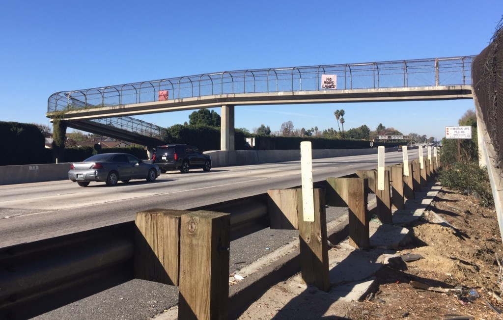 Downey Freeway Fighters Hang NO MORE LANES Banner over 5 Freeway