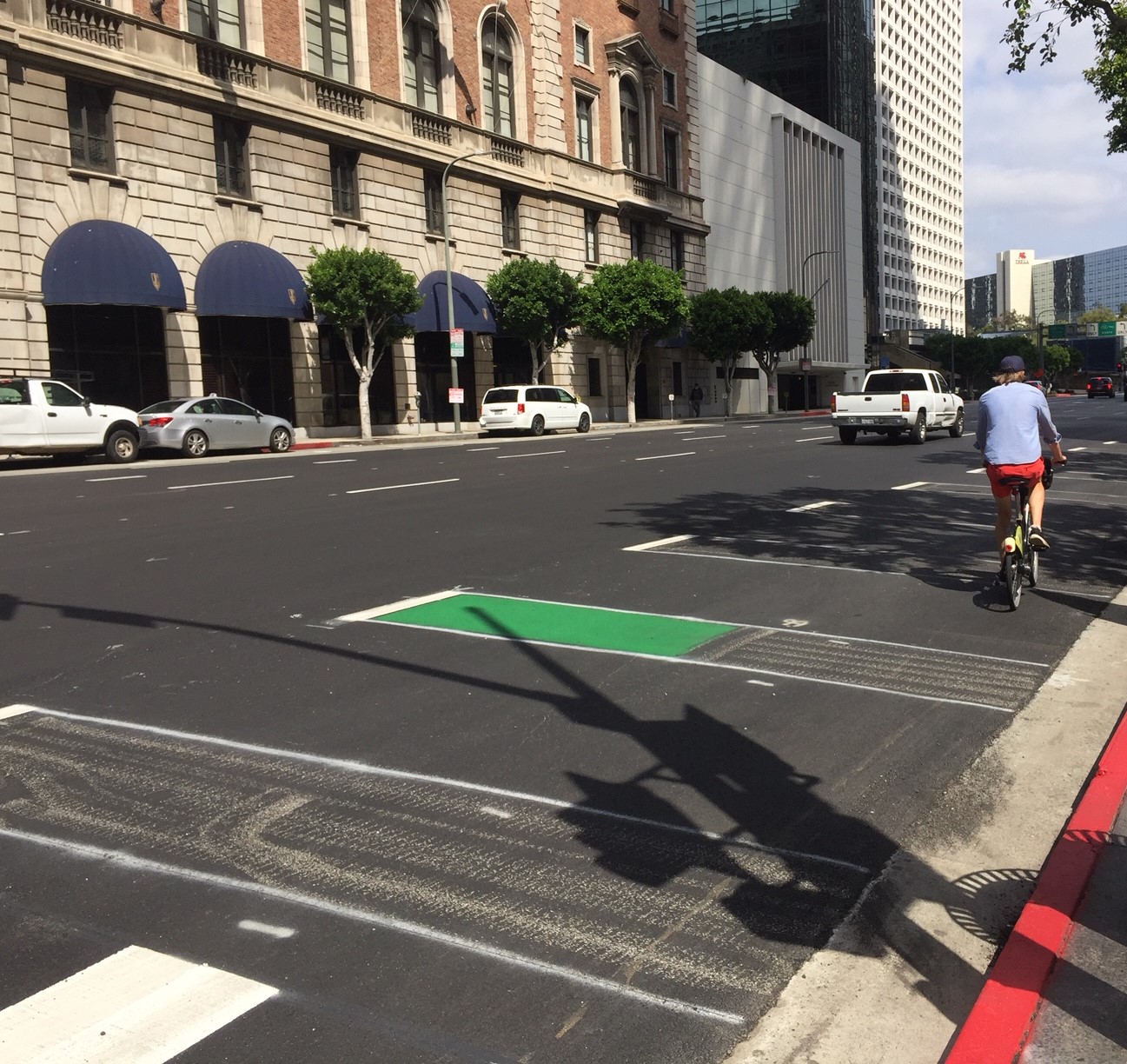Portions of the project include green pavement in merge areas. This green pavement is still being added.