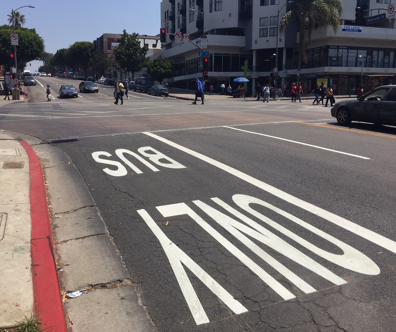 New Alvarado Street bus lane markings at the northeast corner of MacArthur Park. In this area Alvarado has three scramble diagonal crossings.