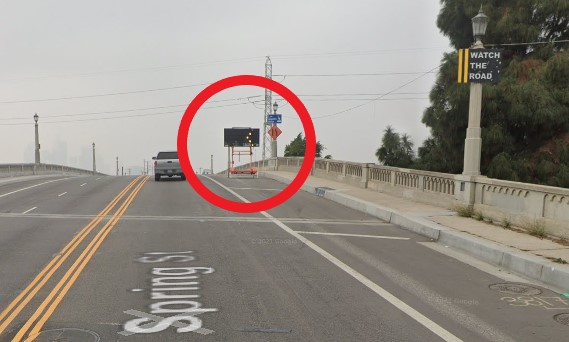 The right southwest-bound lane of North Spring Street has been closed for more than two years after roadway construction was completed, inconeniencing drivers and endangering cyclists