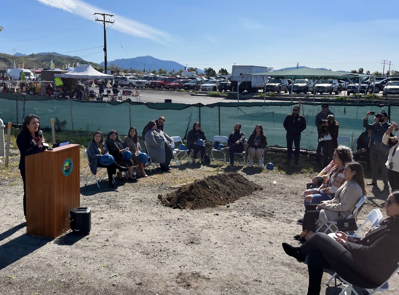 Assemblymember Luz Rivas (left) speaking at this morning's groundbreaking
