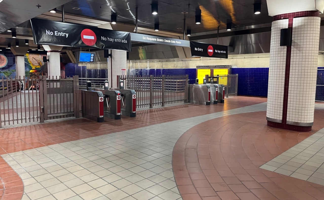 Fare gates at the west end of the station have been closed off, so allow riders to exit only