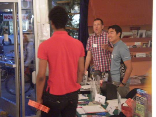 Eric Knutzen at the sign in_1.JPG